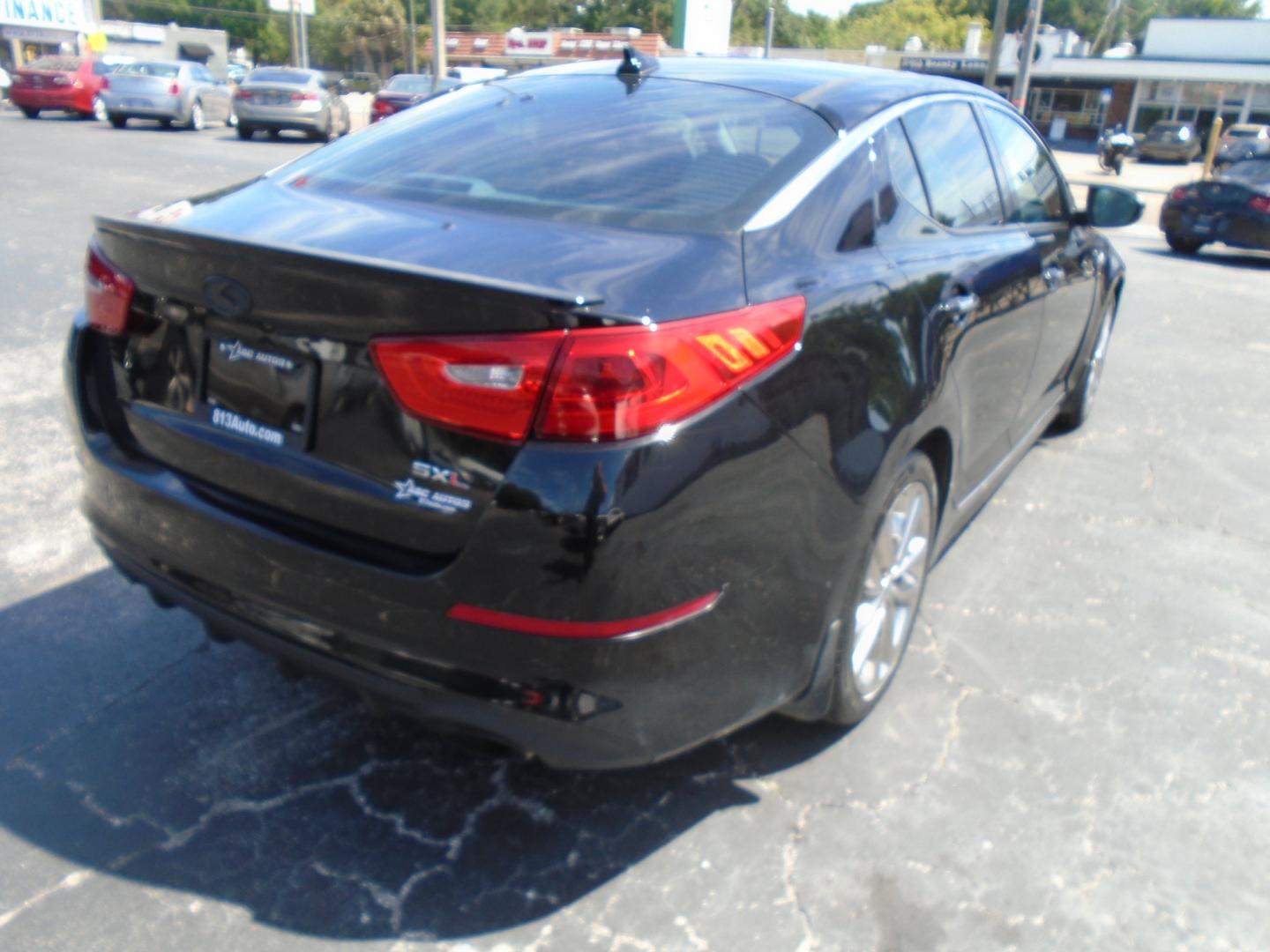 2014 Black /Grey Kia Optima SX Turbo (5XXGR4A68EG) with an 2.0L L4 DOHC 16V TURBO engine, 6-Speed Automatic transmission, located at 6112 N Florida Avenue, Tampa, FL, 33604, (888) 521-5131, 27.954929, -82.459534 - Photo#3